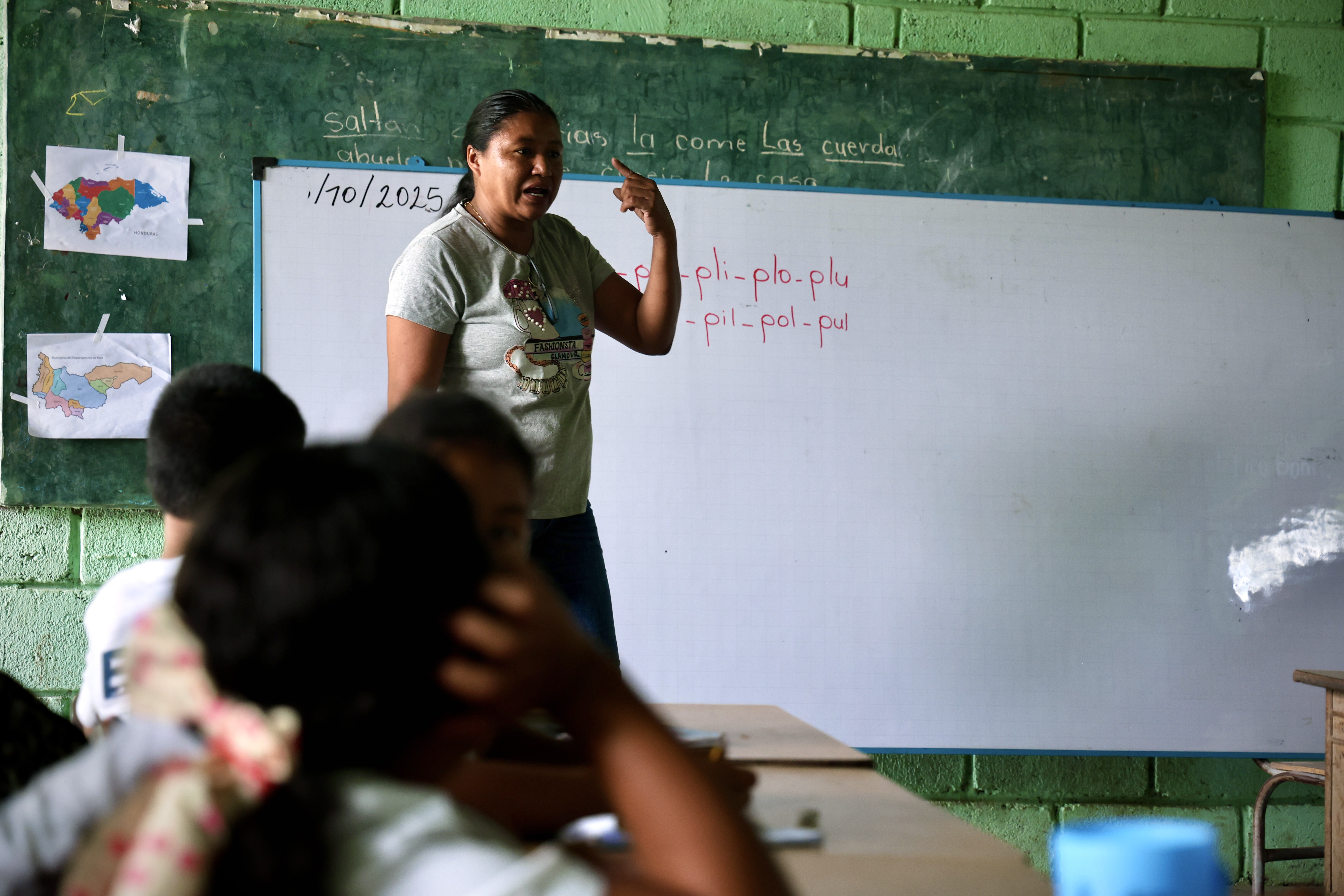 Teacher at chalkboard